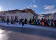 Early morning gondola queue at the bottom station in Bansko during peak February season